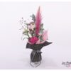 Blumenstrauß in Seidenpapier mit gefüllten Lilien, Hortensie, Nelken, Pampasgras, Wiesenknopf und Eukalyptus