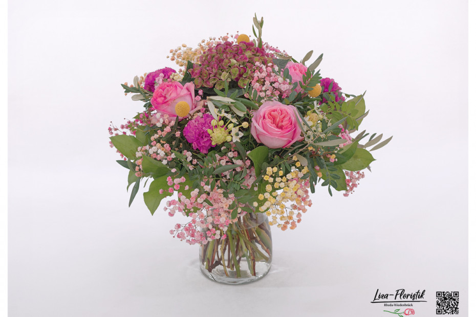 Blumenstrauß mit buntem Schleierkraut, französische Hortensien, Craspedia, Nelken und Ornithogalum