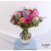 Blumenstrauß zum Geburtstag mit verschiedenen Rosen, Santini, Gerbera, Waxflower, Kamille, Nelken und bunten Ballons