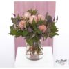 Blumenstrauß mit rosa Rosen Pomarosa, Nelken, Clematis und weißem Schleierkraut