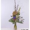 Exotische Protea, kräftige Hortensie und zarte Löwenmäulchen vereinen sich in diesem stilvollen Blumenstrauß zu einer harmonischen Komposition mit Eukalyptus und Monstera.