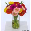 Blumenstrauß Lintel mit Gerbera in kräftigen Farben wie Pink, Orange, Gelb und zartem Rosa, liebevoll rund gebunden und mit Grün ergänzt.