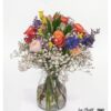 Buntes Bouquet mit Rosen und Hyazinthen in Orange, Rosa, Blau und Violett, locker und harmonisch gebunden.