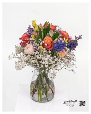 Buntes Bouquet mit Rosen und Hyazinthen in Orange, Rosa, Blau und Violett, locker und harmonisch gebunden.